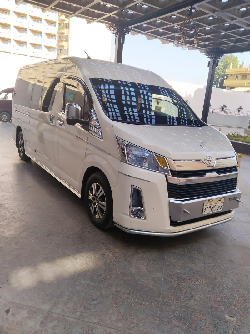 White Toyota HiAce van